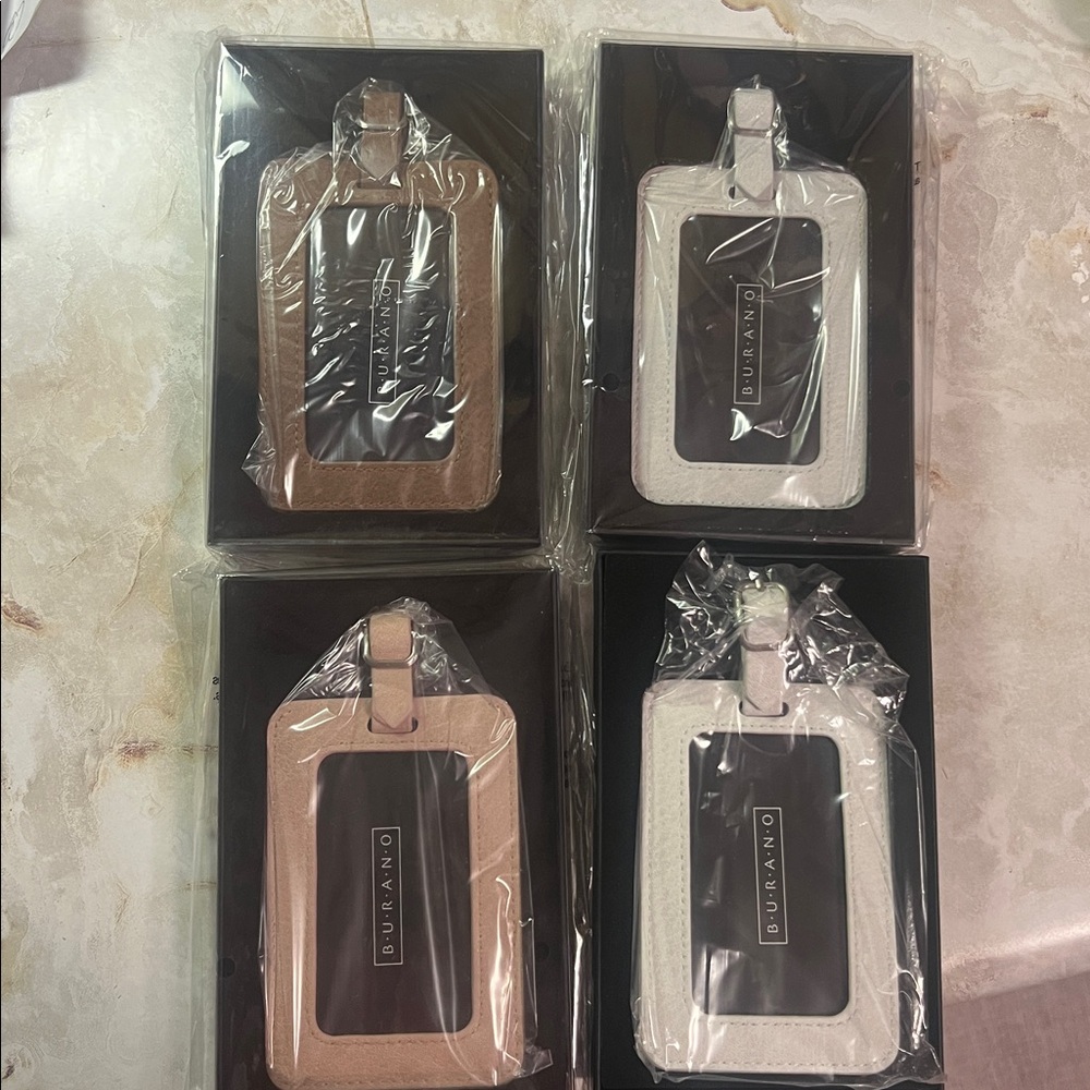 New in package! Burano Vegan leather luggage tags comes in a original box.